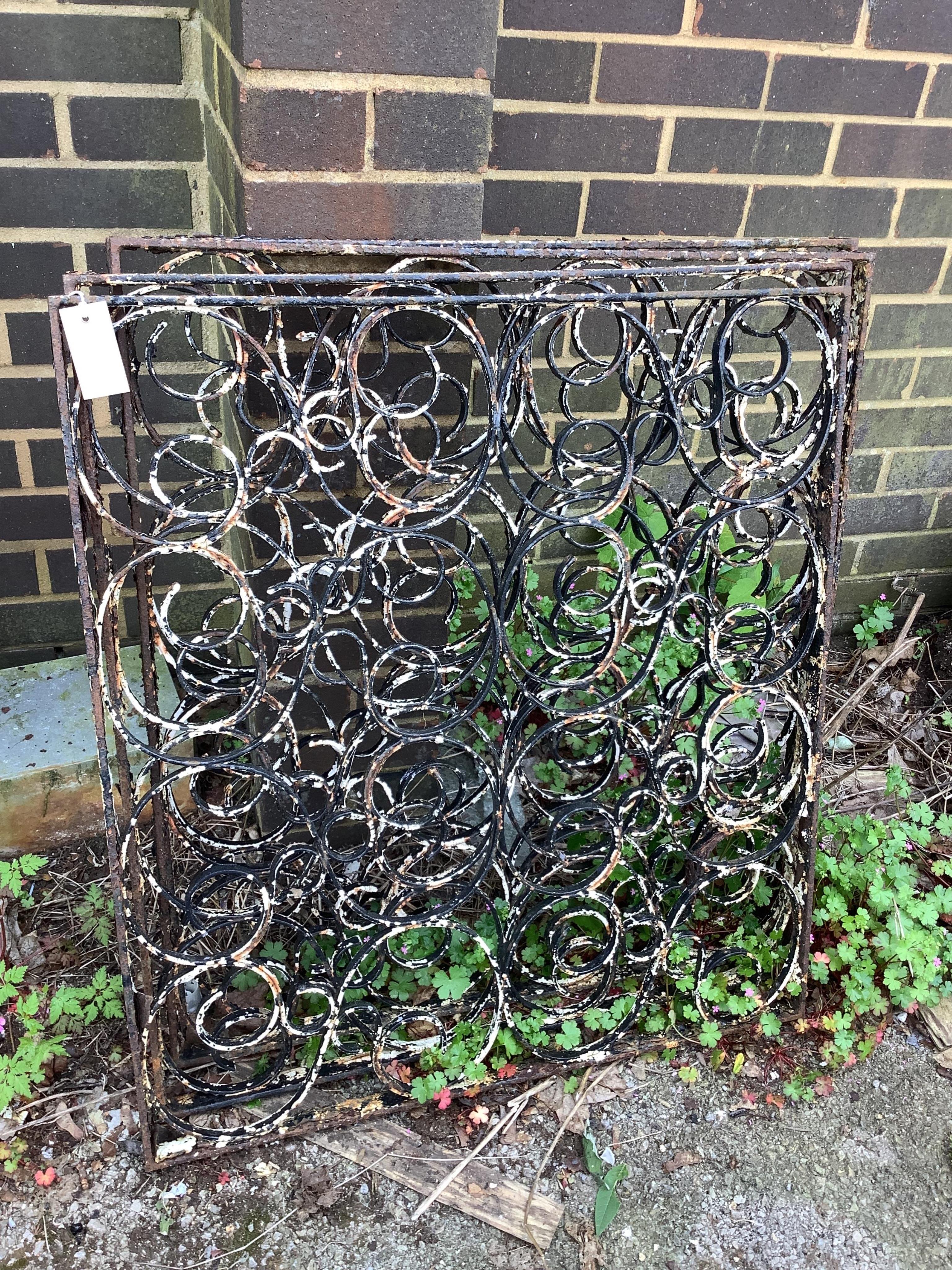 A set of four painted wrought iron rectangular garden panels, width 71cm, height 78cm
